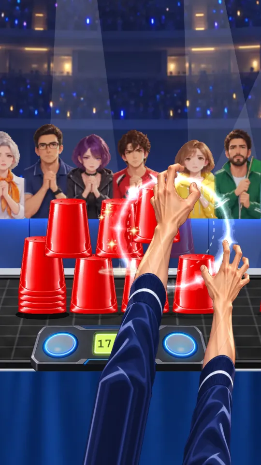 スマホの縦画面。スポットライトのアリーナで、サイクルの1-10-1のまん中の10個ピラミッドを積んでいる途中。画面の下からのびた右手がカップを上の段へ運び、置く位置に白く光るビートの輪。左には重ねたカップの山、手前に計測タイマー、奥の仕切りの後ろで観客が手を組んで見守っている